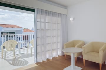 a room with a table and chairs