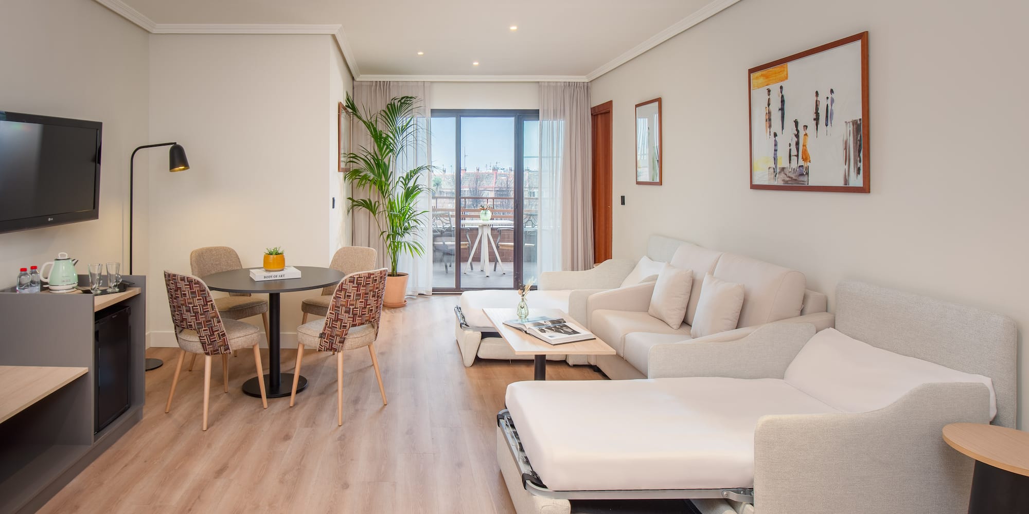 a living room with a couch and a table