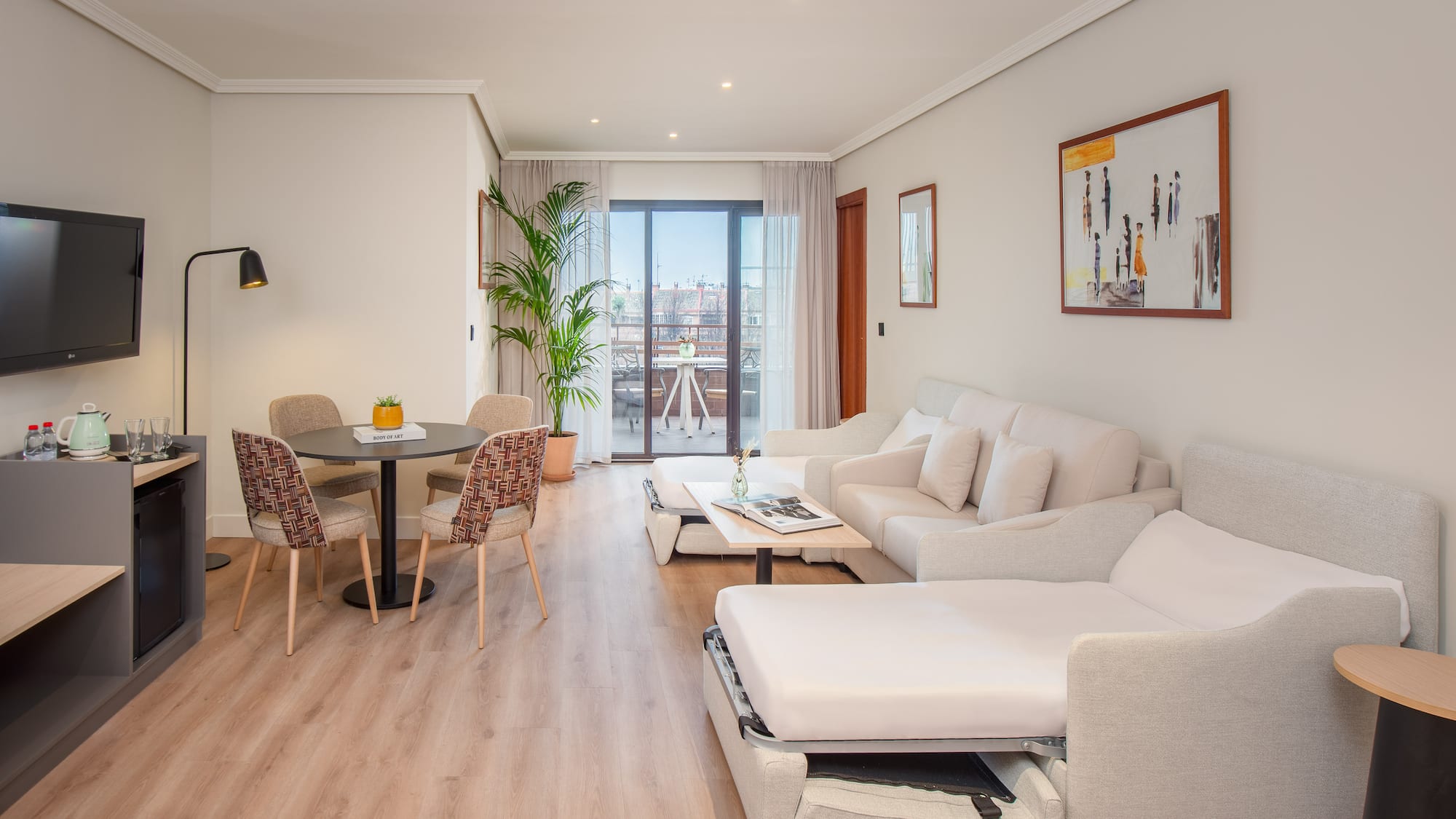 a living room with a couch and a table