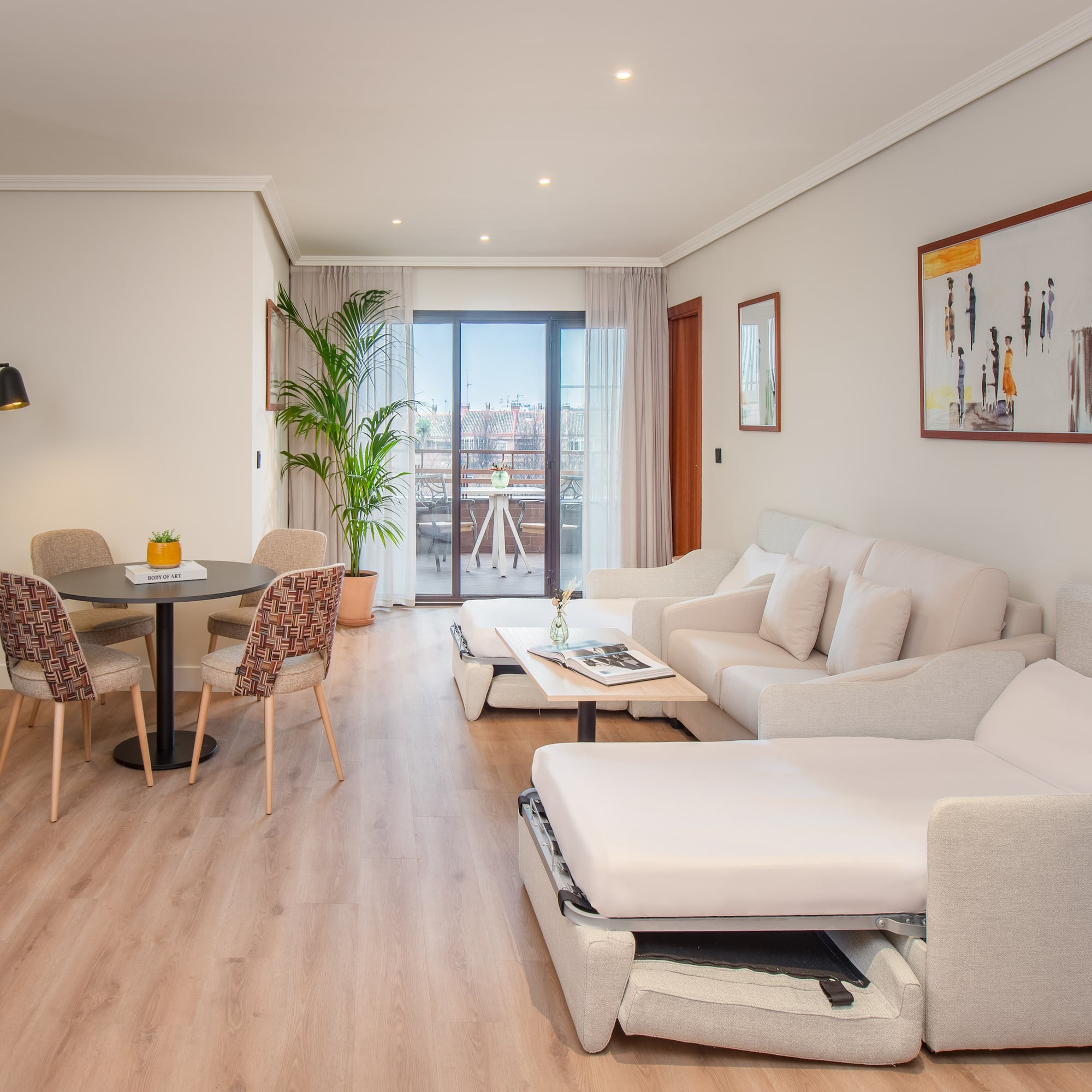 a living room with a couch and a table