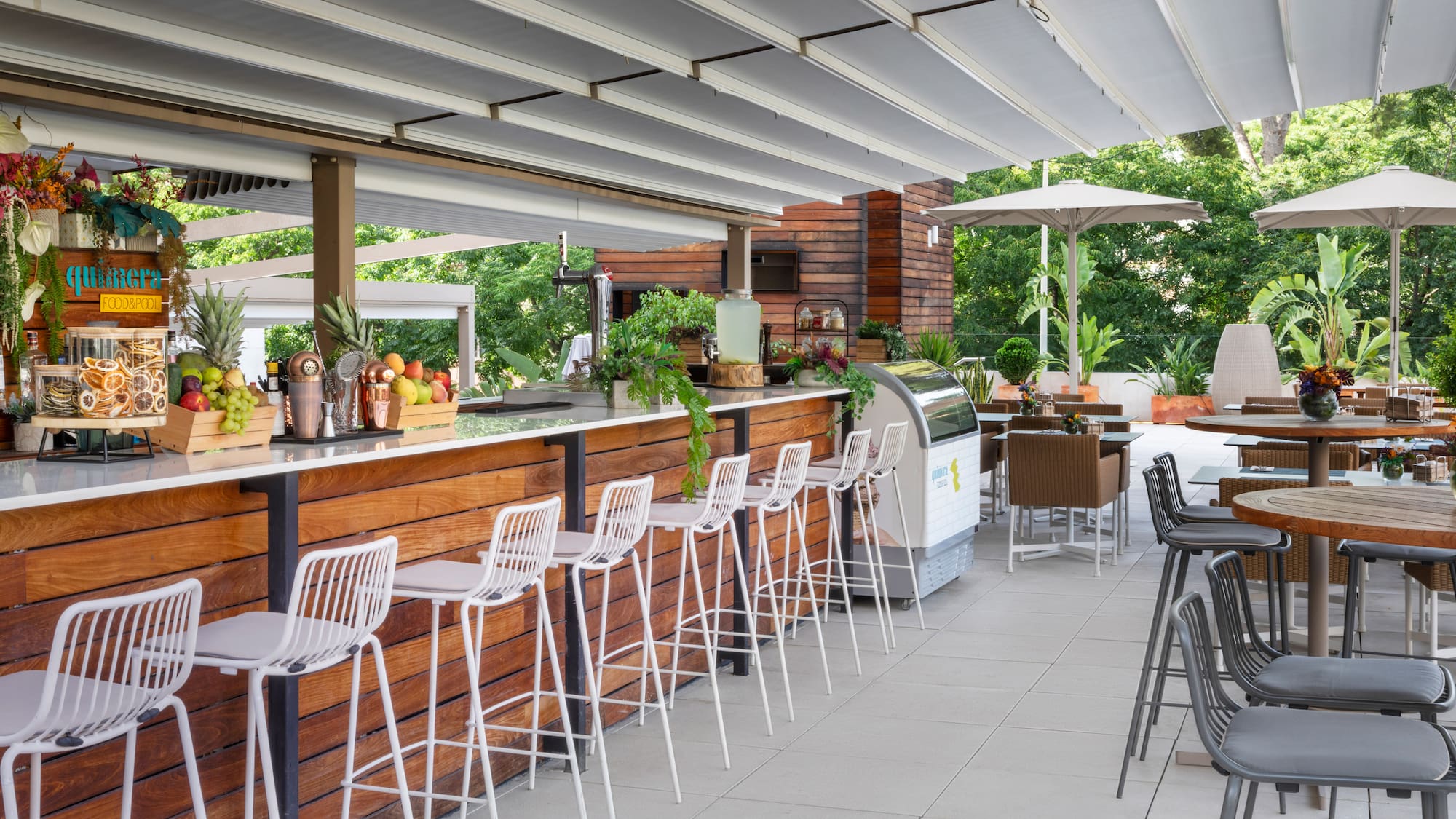 a bar with chairs and tables