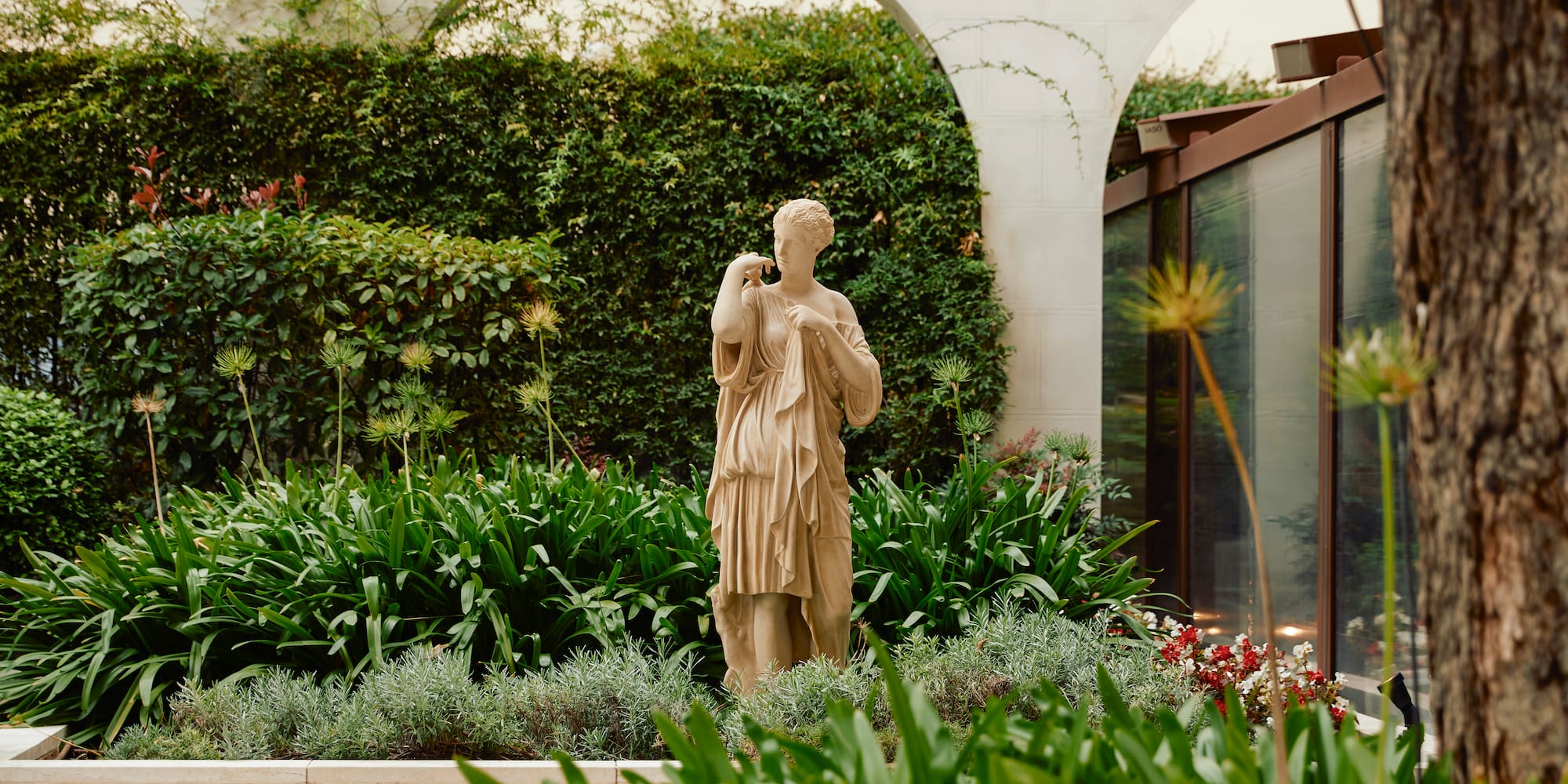 a statue in a garden