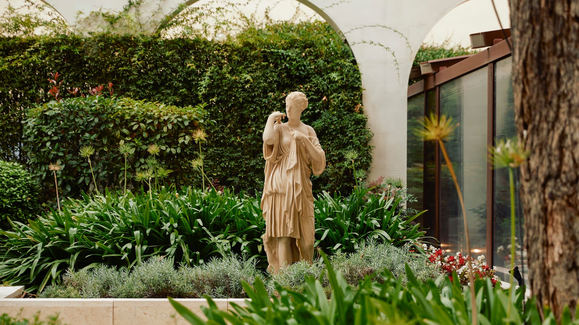 a statue in a garden