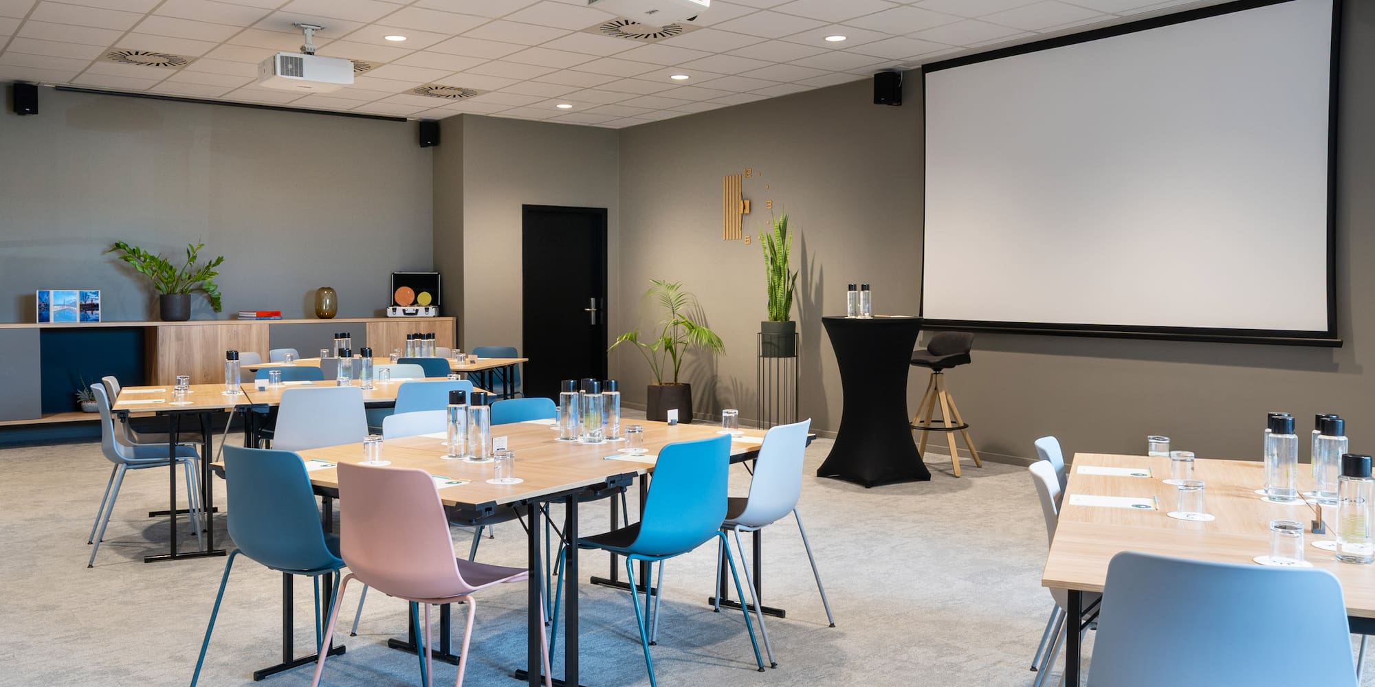 a room with tables and chairs