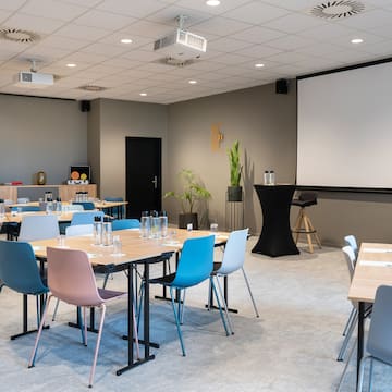 a room with tables and chairs
