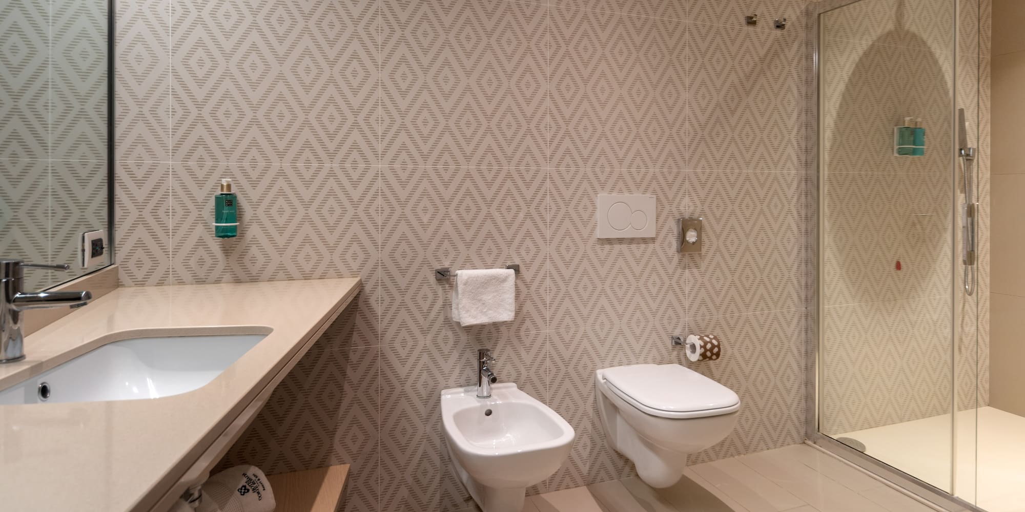 a bathroom with a sink and toilet