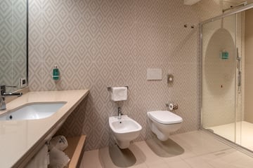 a bathroom with a sink and toilet