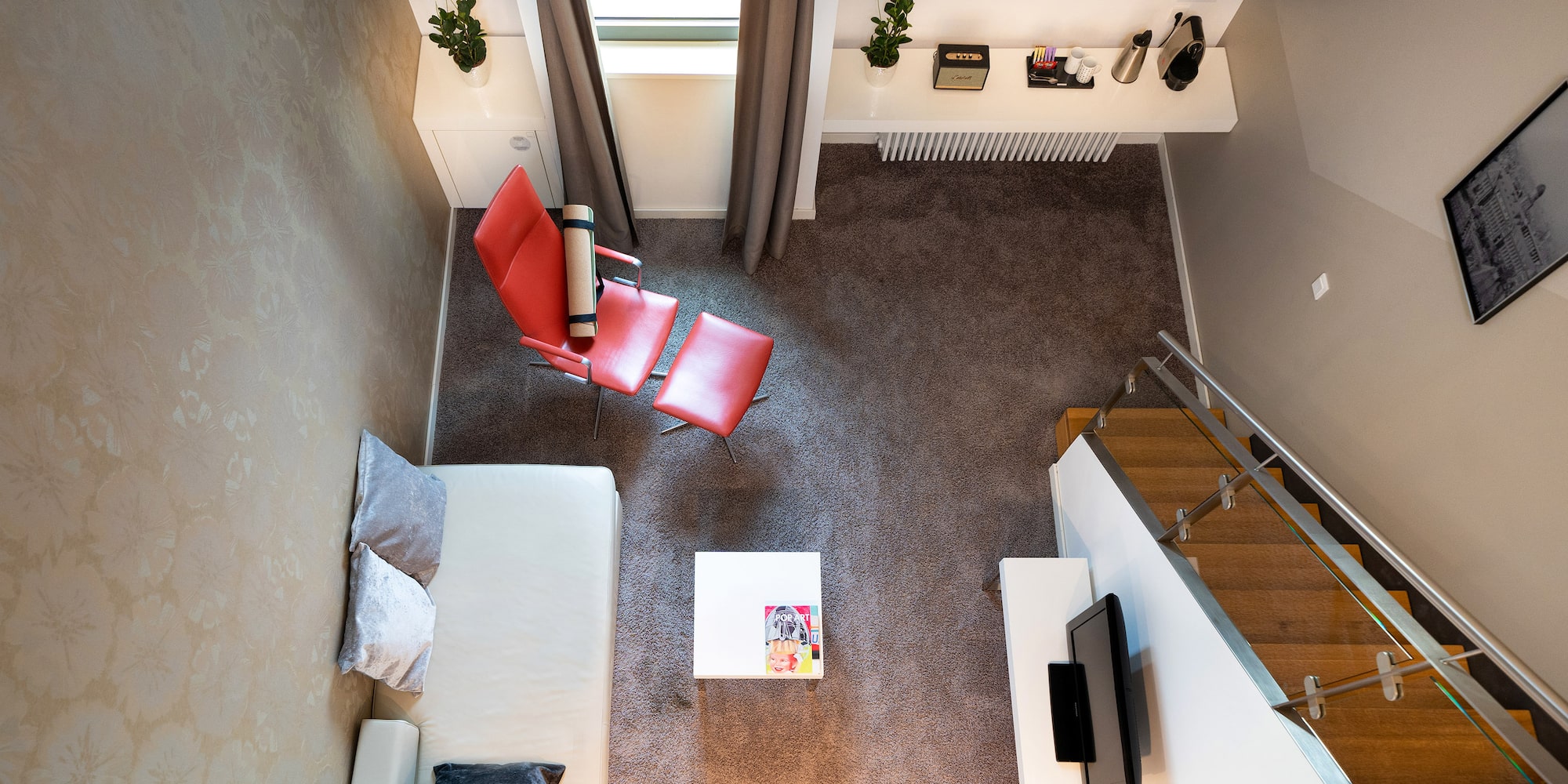 a room with a couch and a tv