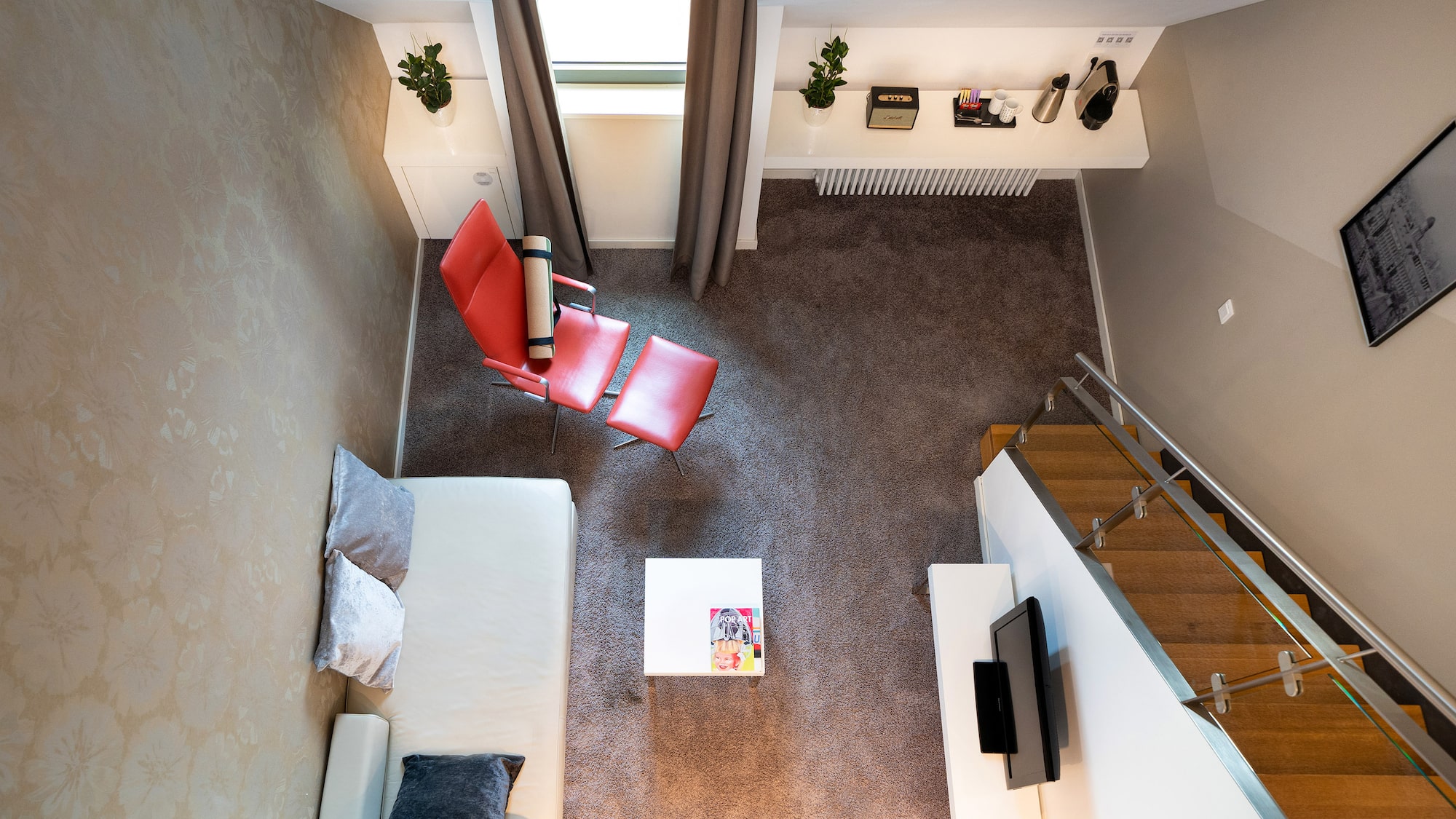 a room with a couch and a tv