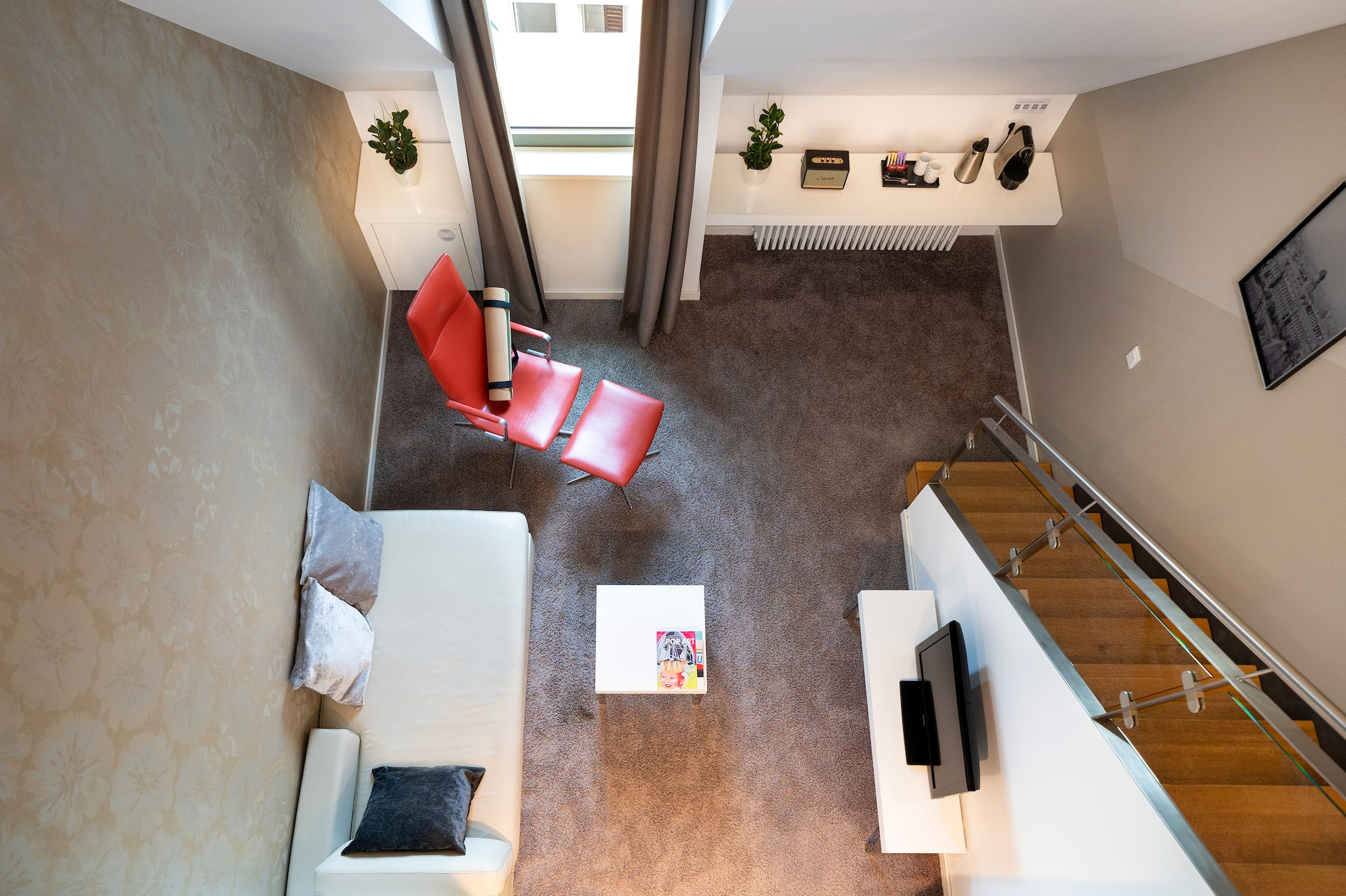 a room with a couch and a tv