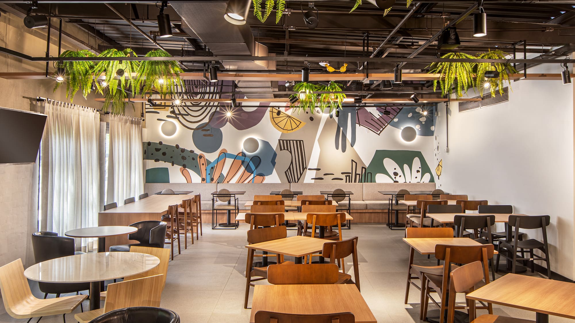 a room with tables and chairs