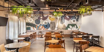 a room with tables and chairs