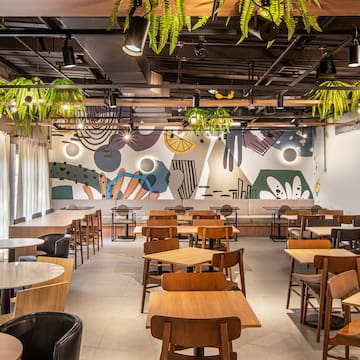 a room with tables and chairs