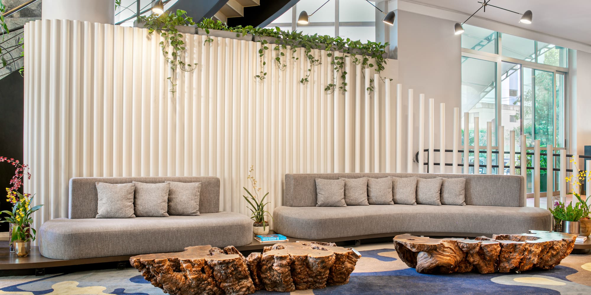 a room with couches and tables