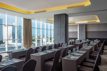 a room with tables and chairs