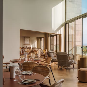 a room with tables and chairs