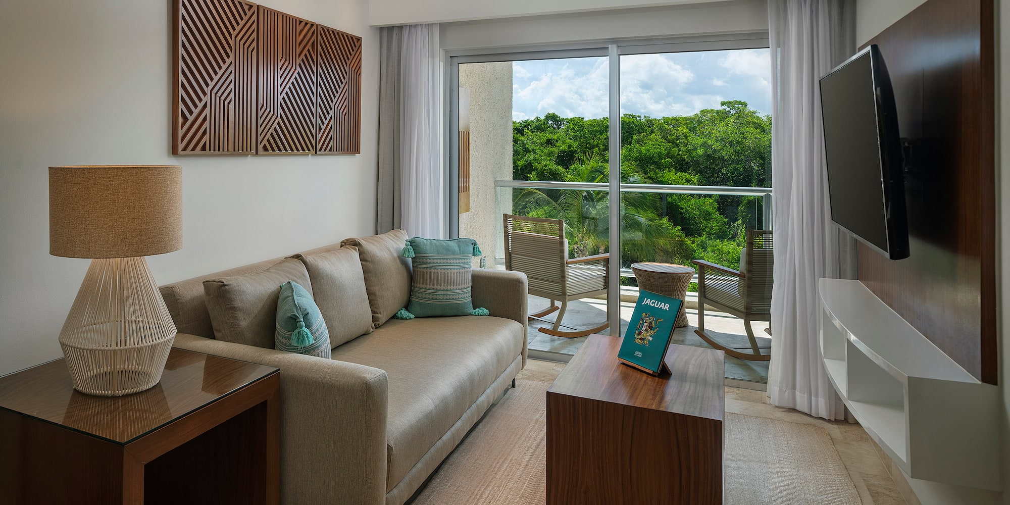 a living room with a couch and a television
