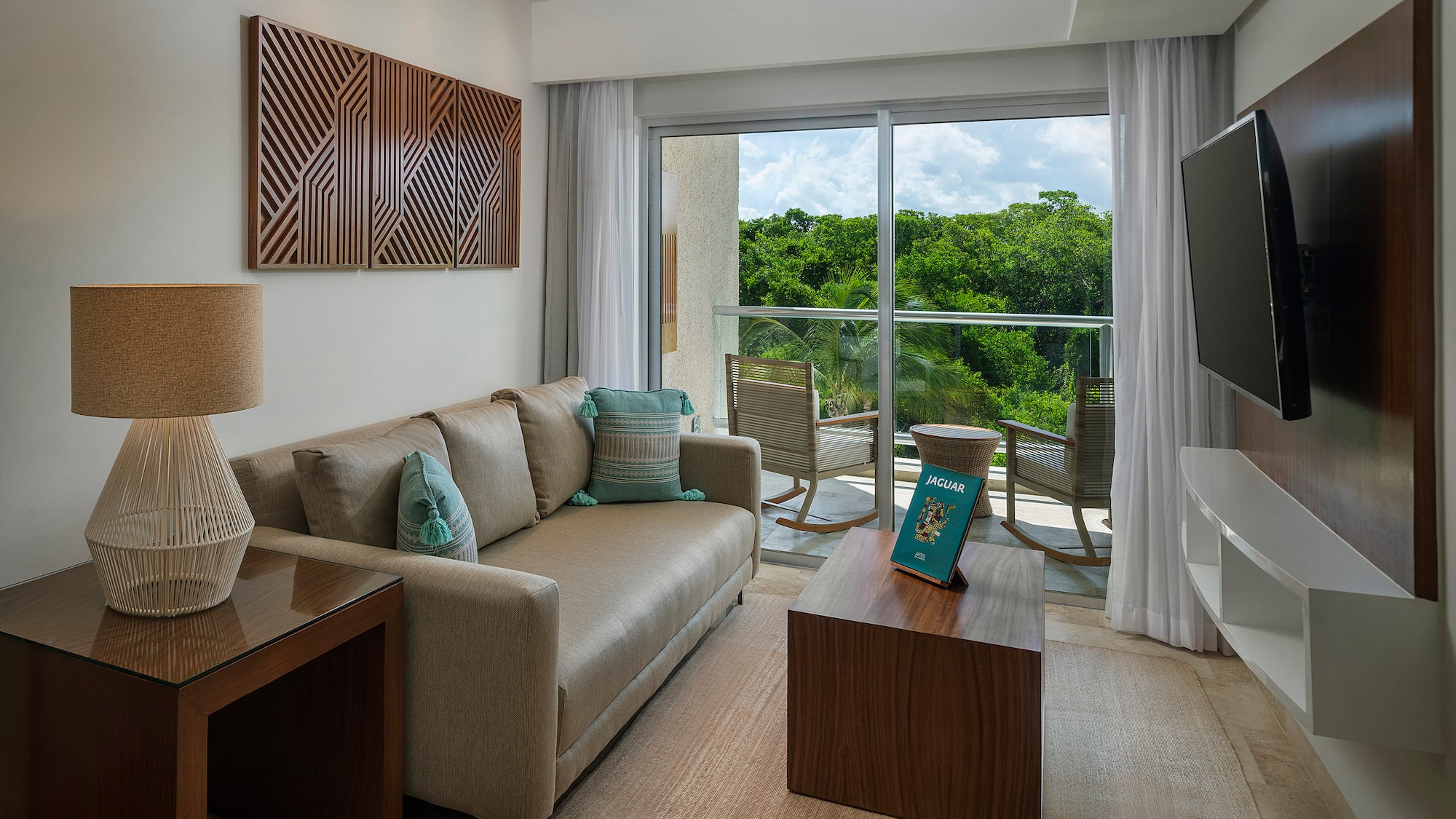 a living room with a couch and a television
