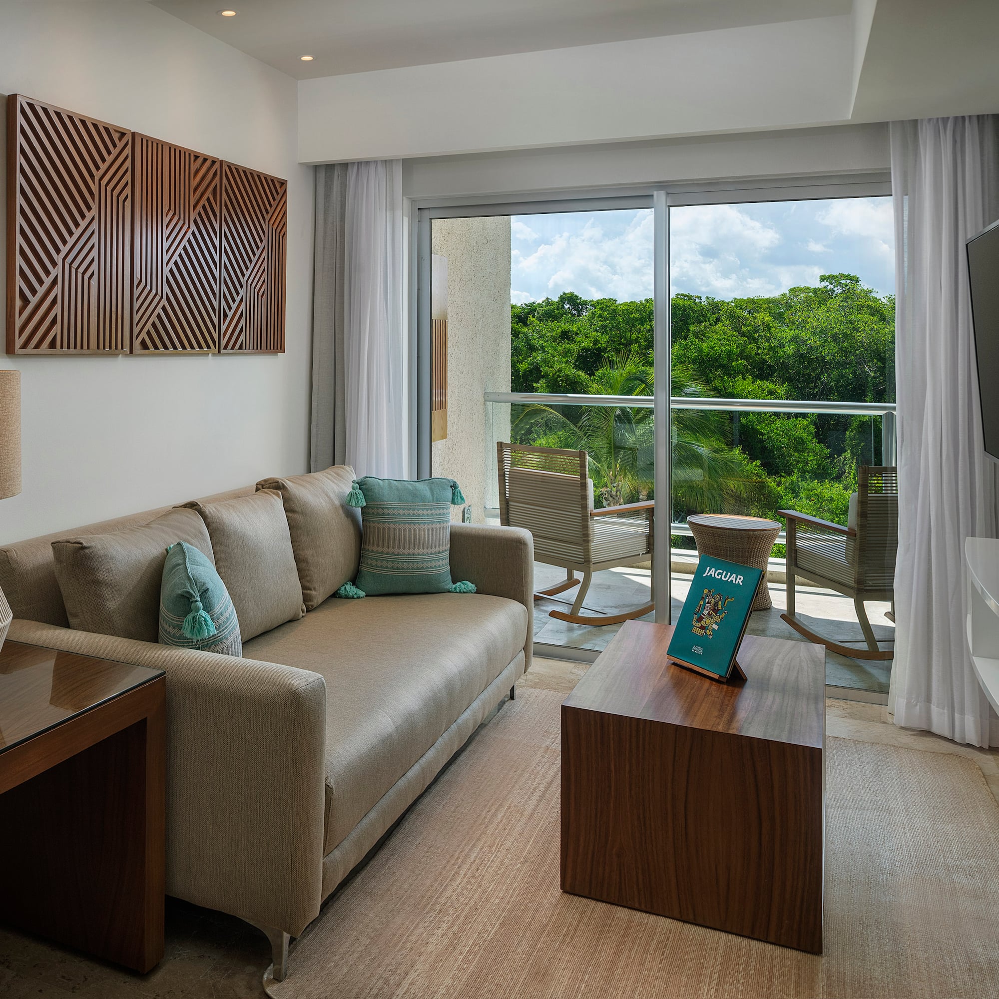 a living room with a couch and a television
