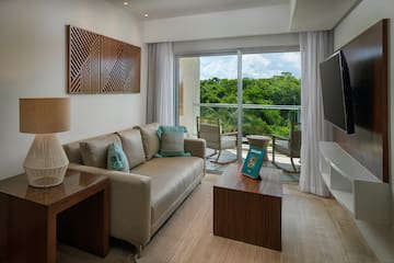 a living room with a couch and a television