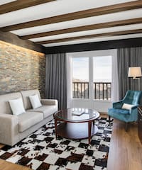 a living room with a couch and a table