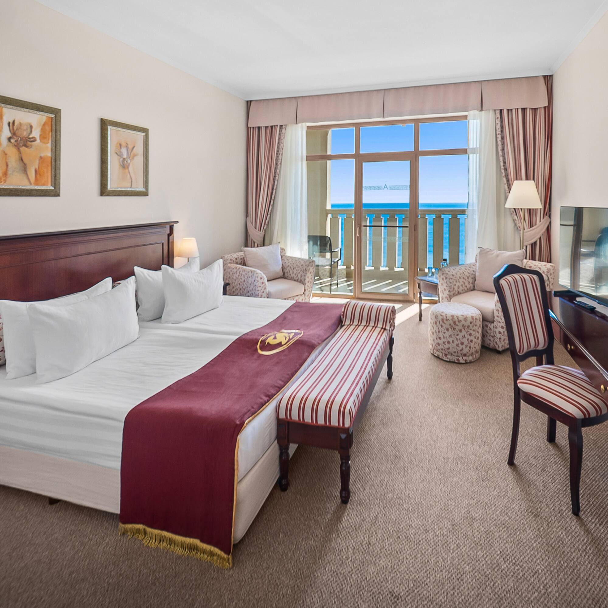 a hotel room with a piano and a bed