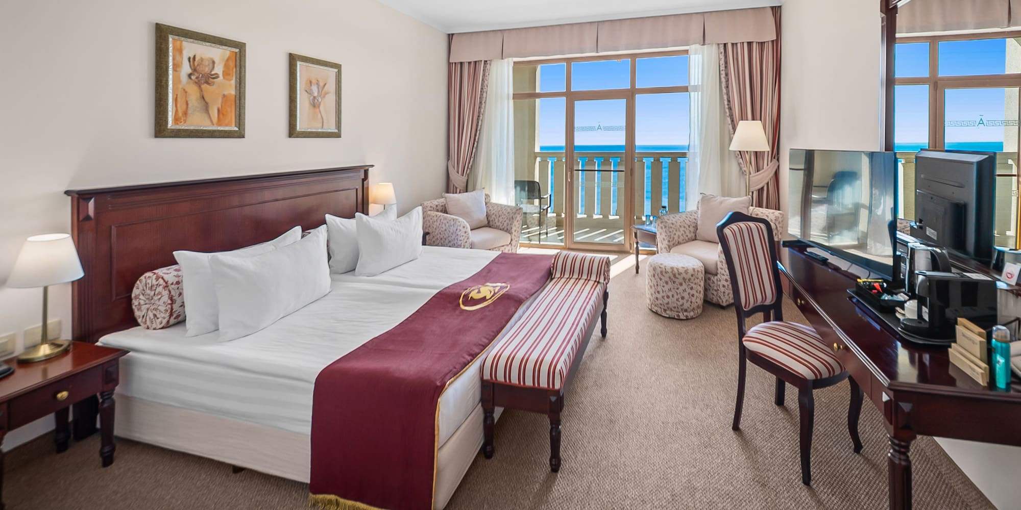 a hotel room with a piano and a bed