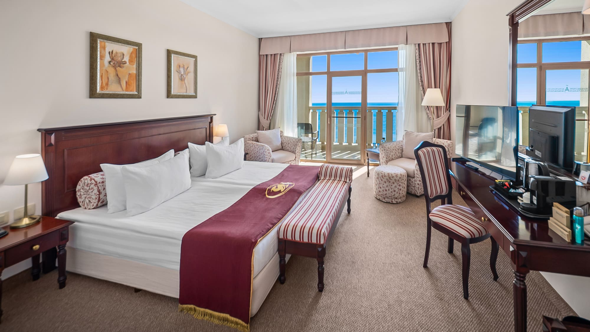 a hotel room with a piano and a bed