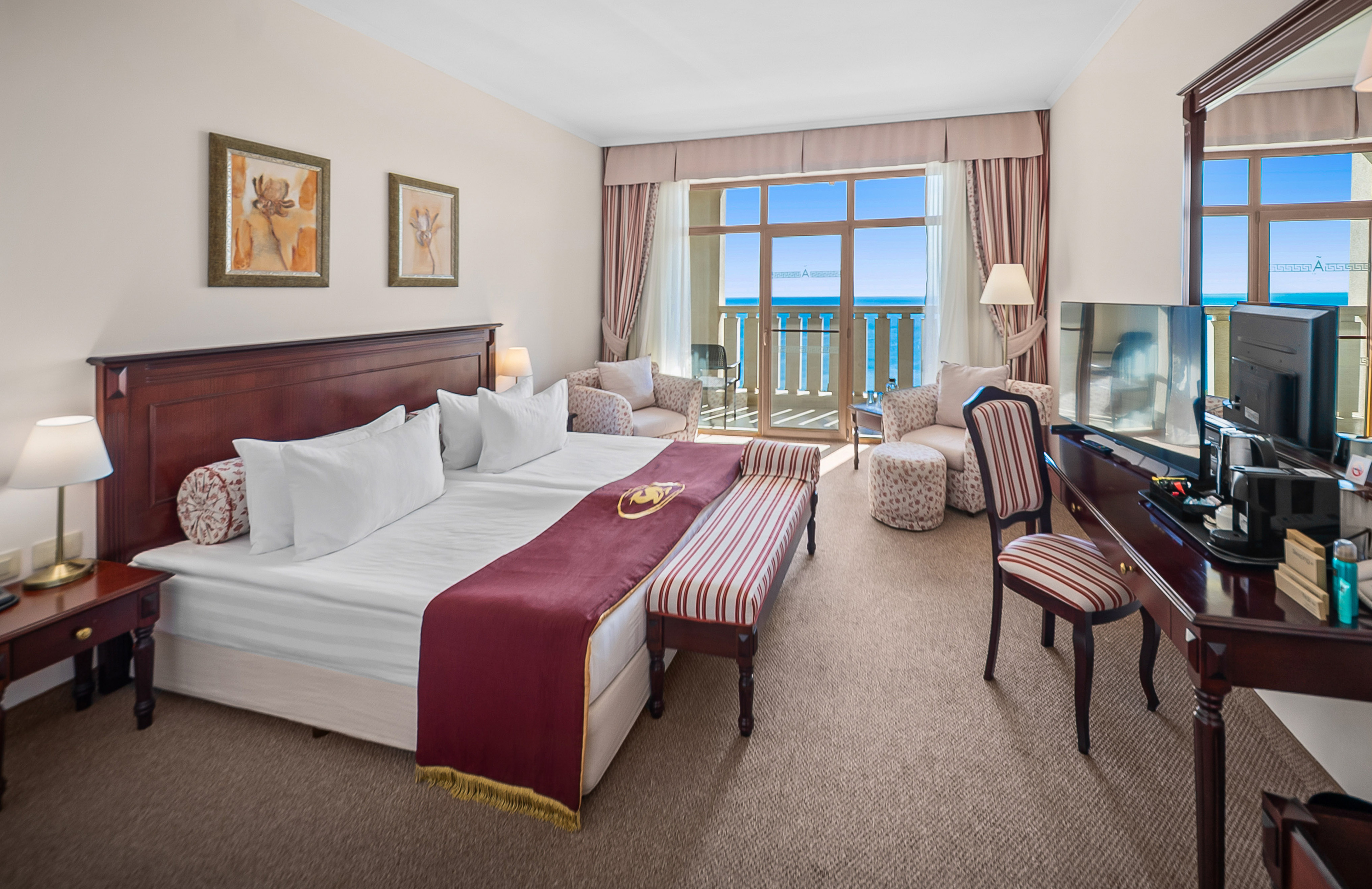 a hotel room with a piano and a bed