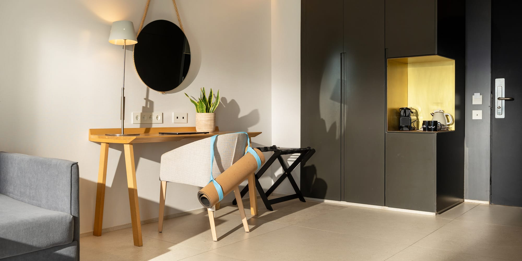 a room with a chair and a desk