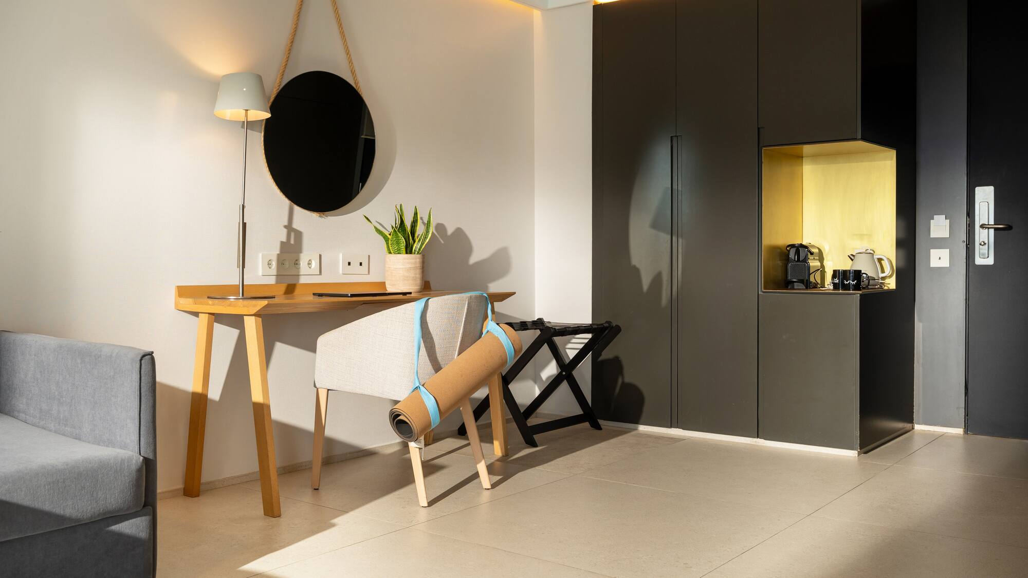 a room with a chair and a desk