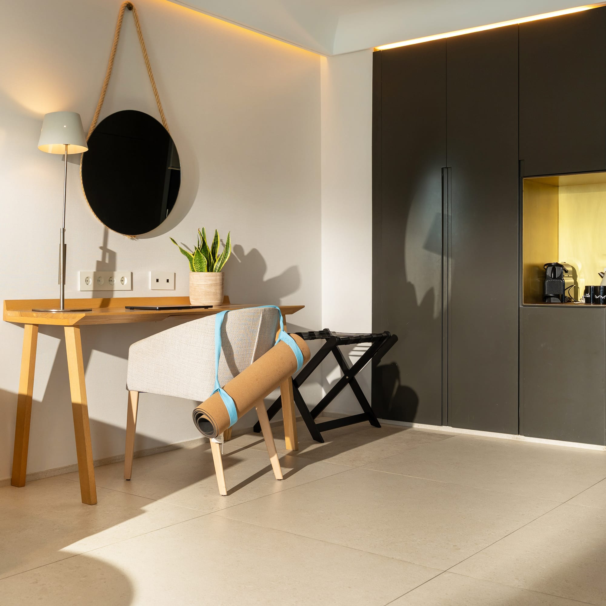 a room with a chair and a desk