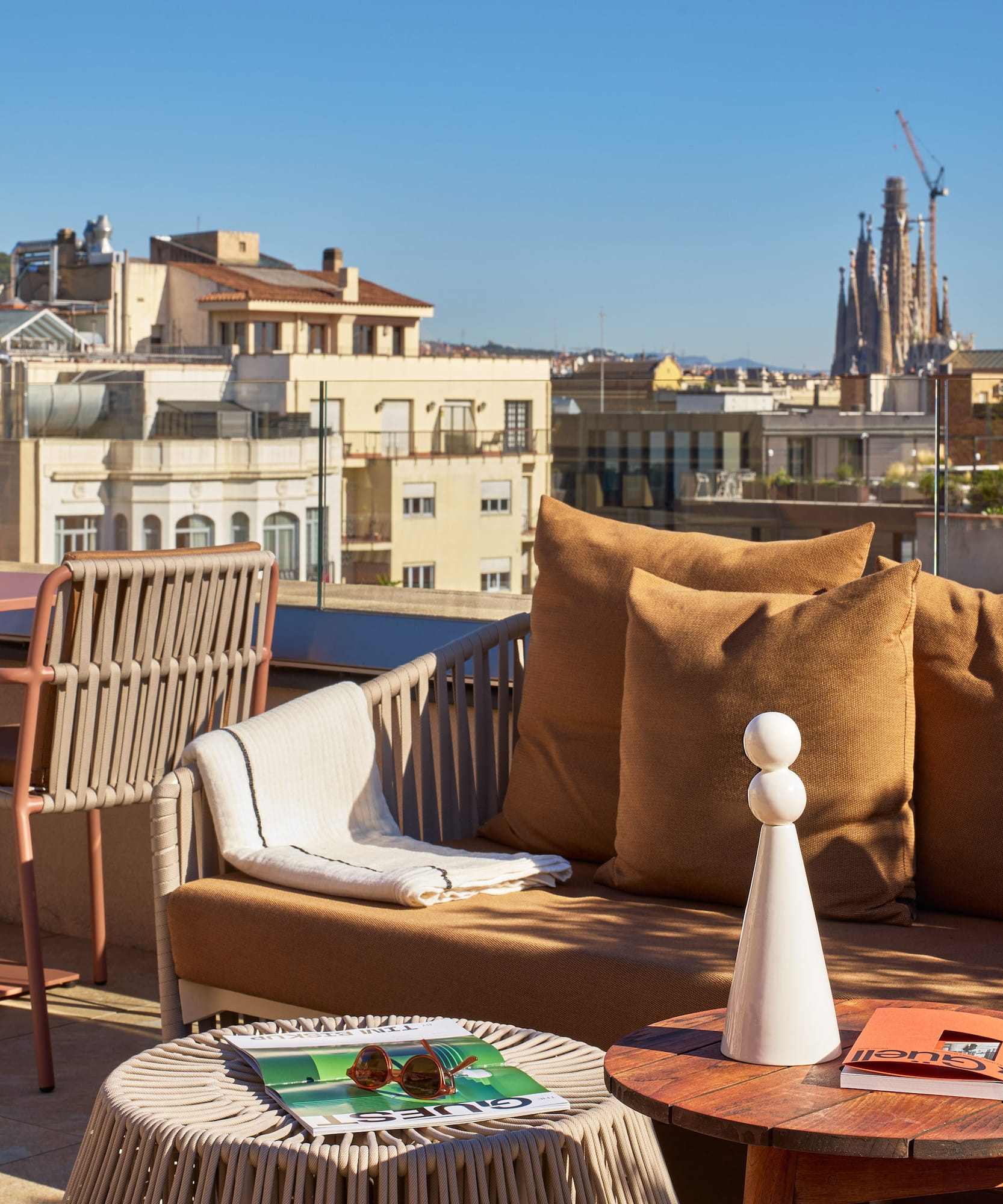 a couch and table on a rooftop