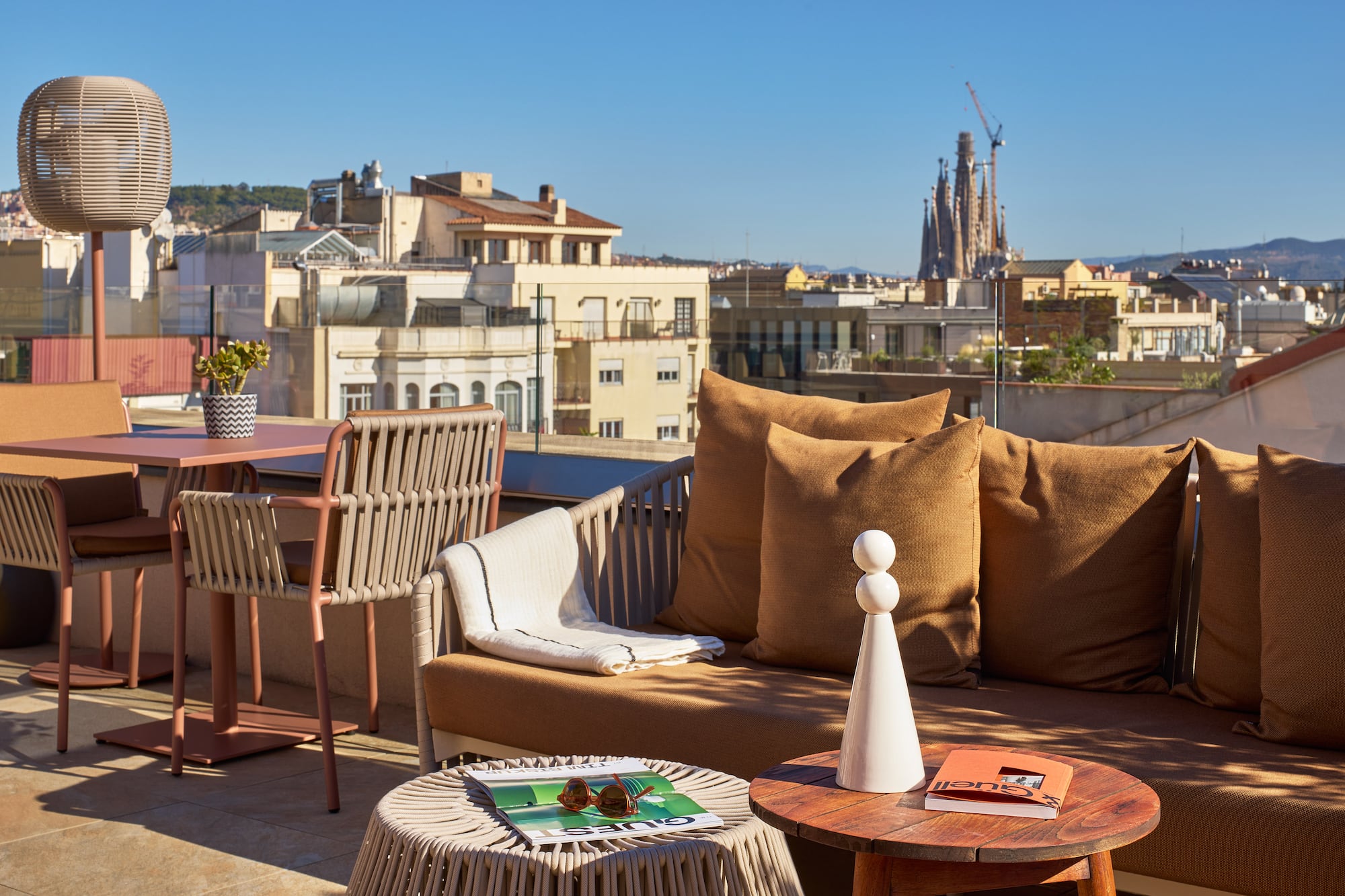 a couch and table on a rooftop
