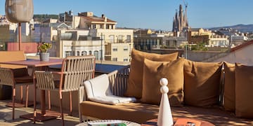 a couch and table on a rooftop