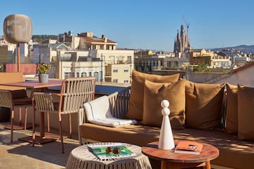 a couch and table on a rooftop