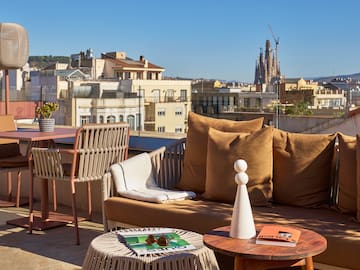 a couch and table on a rooftop