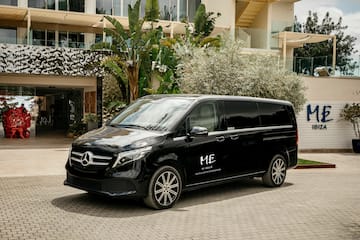 a black van parked in front of a building