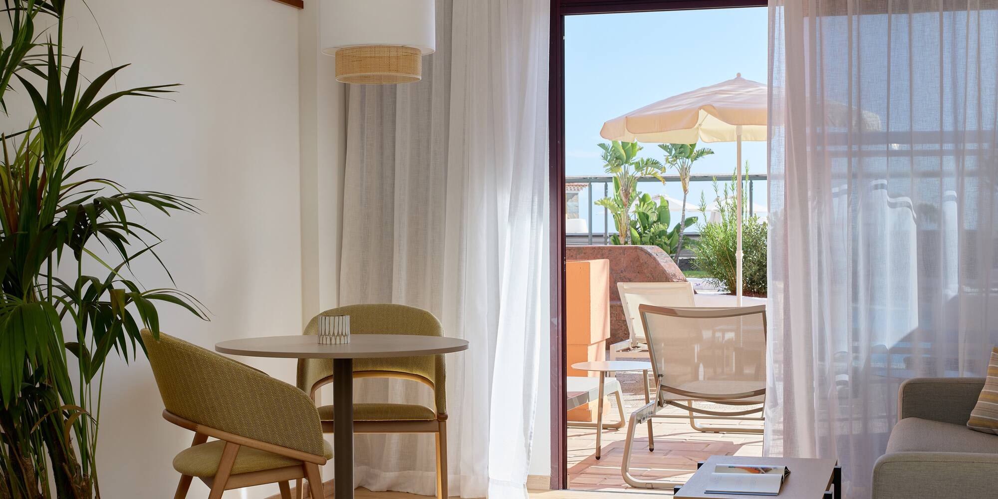 a room with a table and chairs and a table and chairs