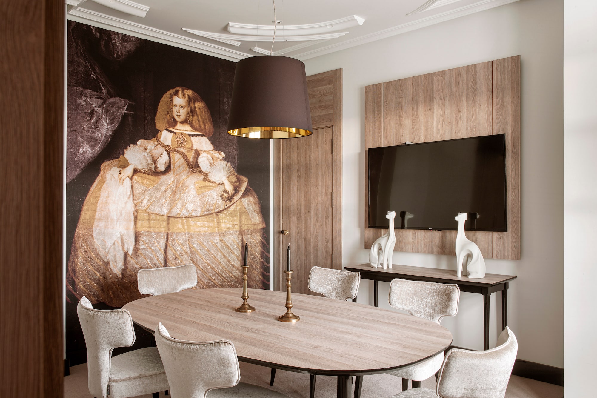 a room with a large painting on the wall