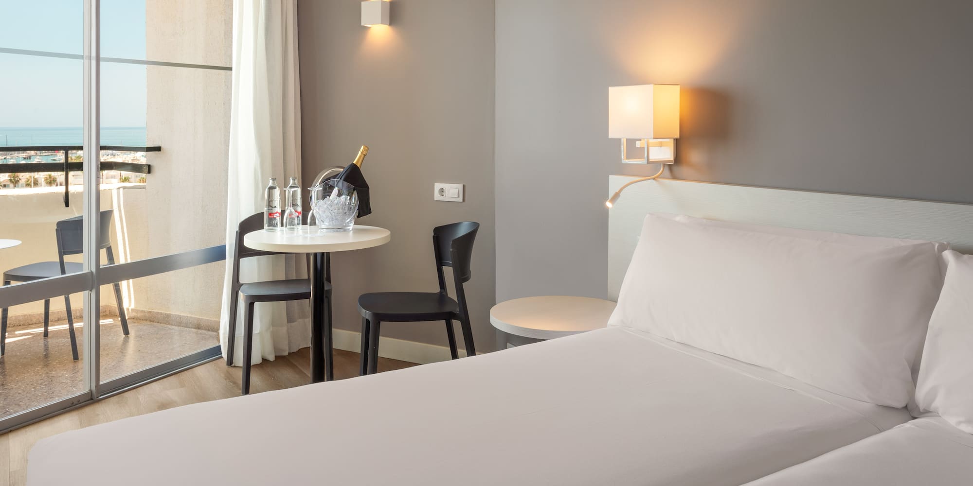 a room with a bed and table