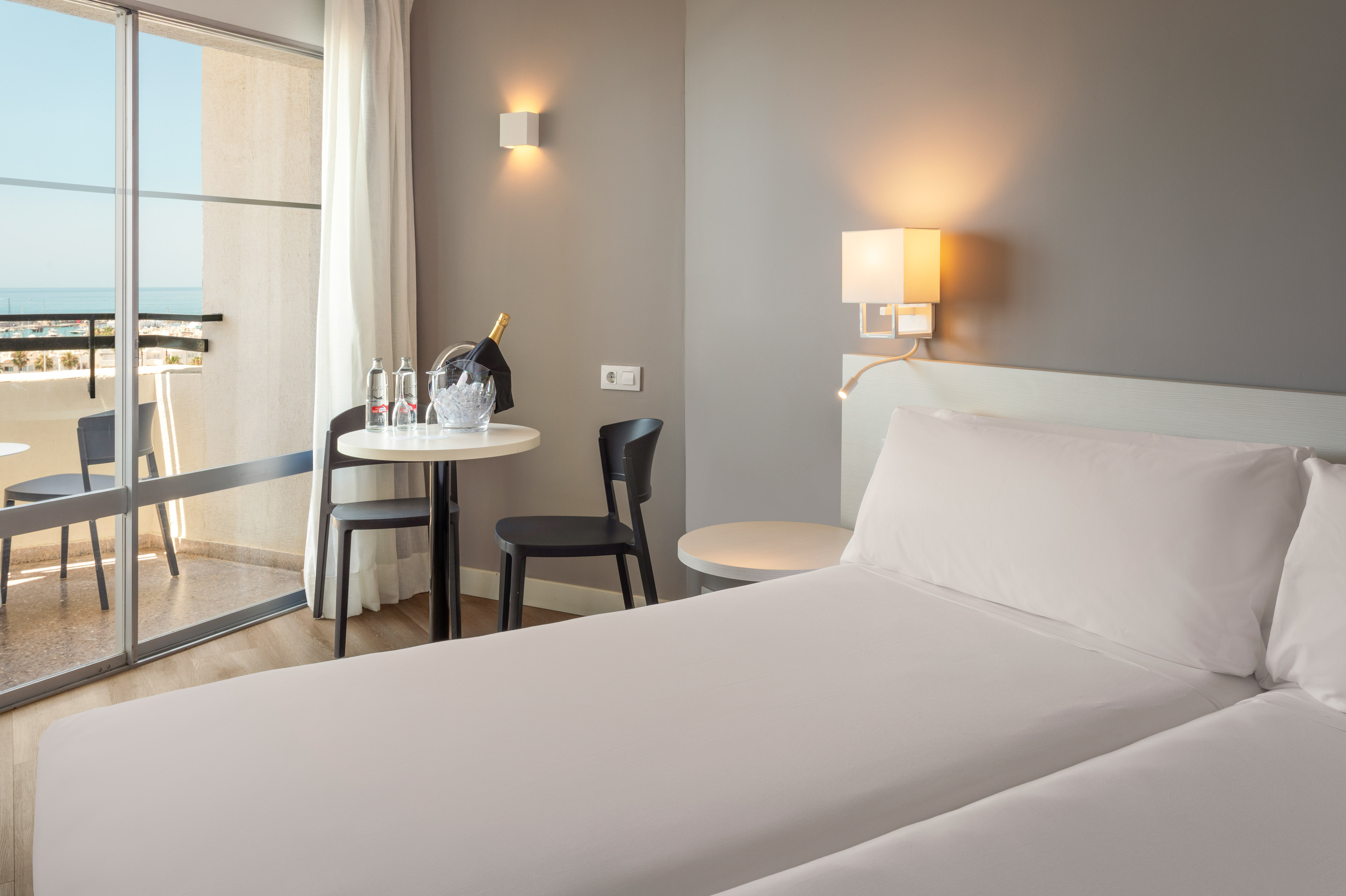 a room with a bed and table