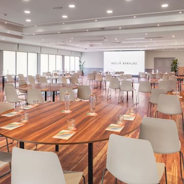 a room with tables and chairs