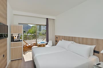 a room with a bed and a table