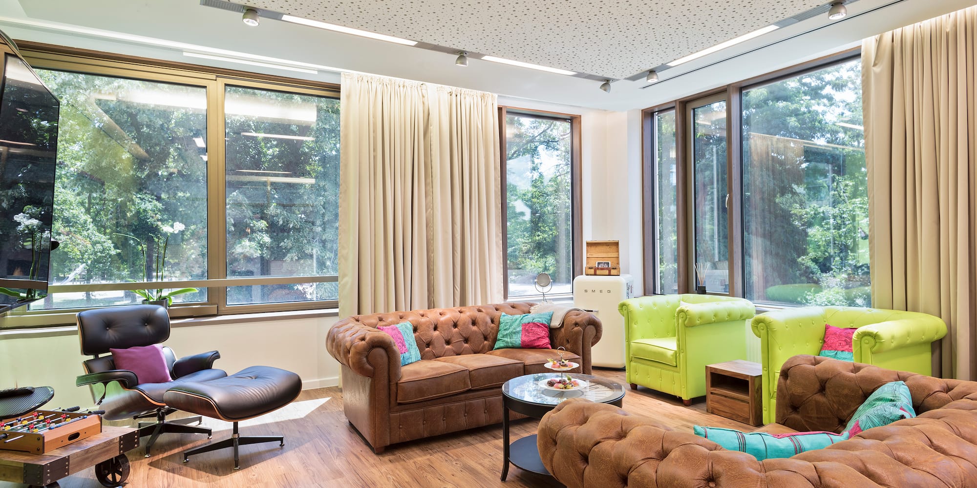 a room with couches and chairs