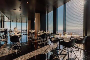 a room with tables and chairs