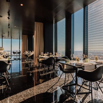 a room with tables and chairs