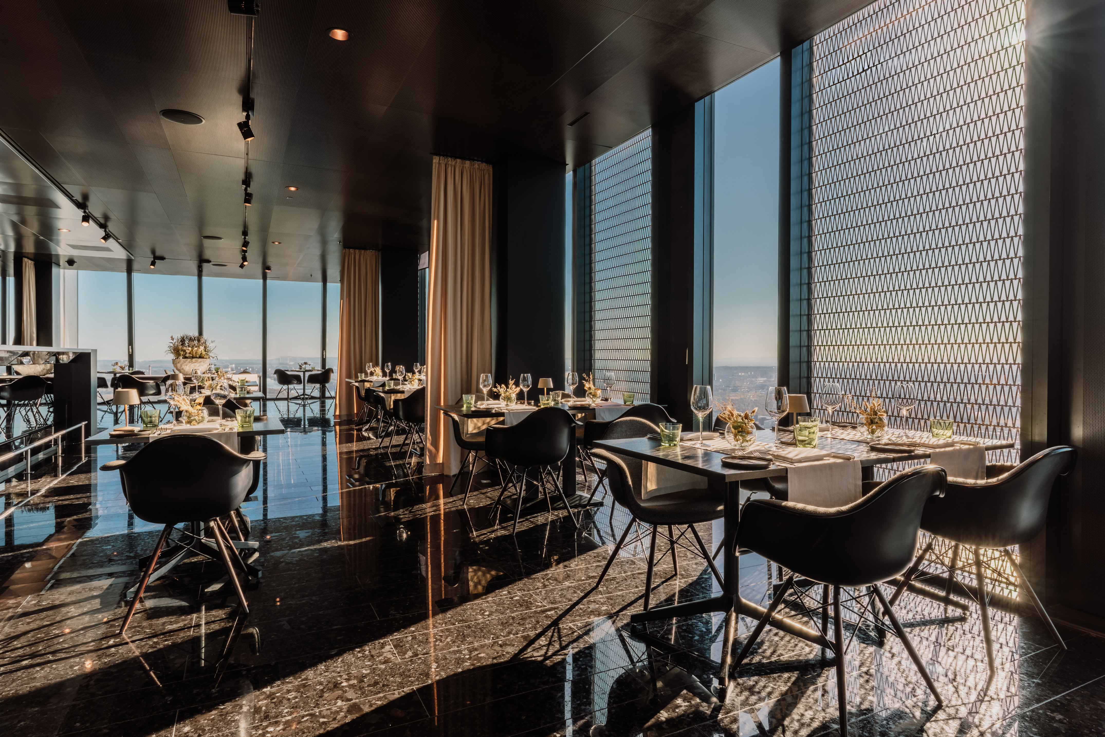 a room with tables and chairs