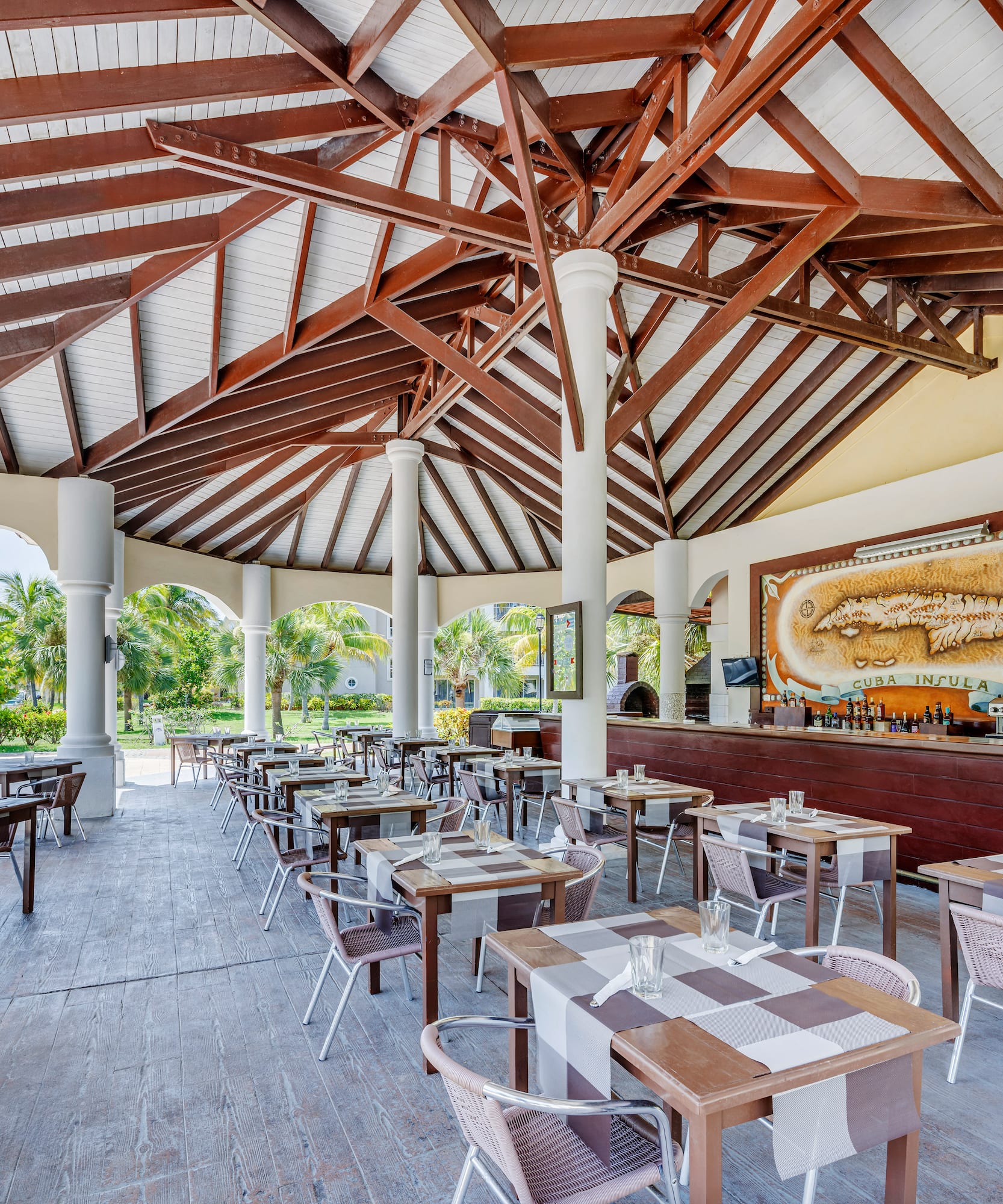 a restaurant with tables and chairs