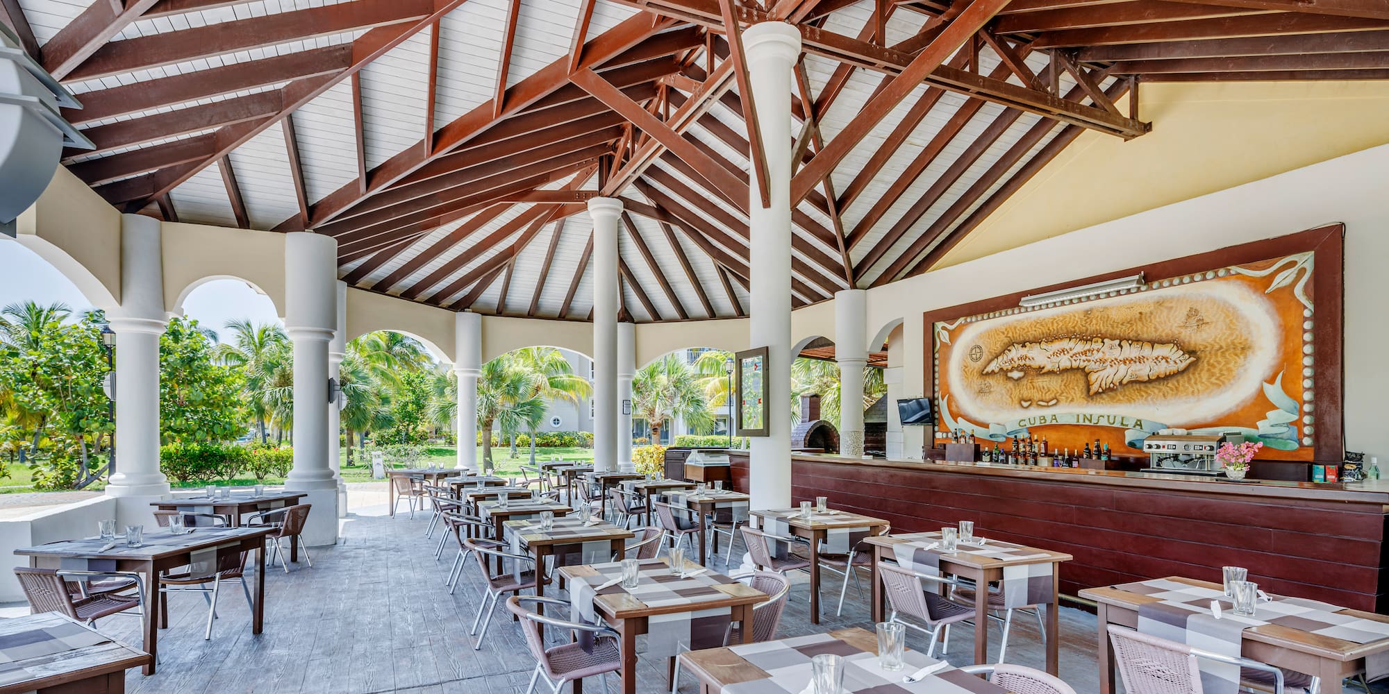 a restaurant with tables and chairs